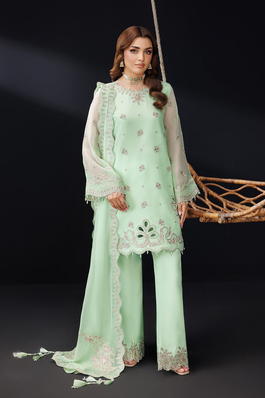Close-up of embroidered cuffs and beadwork on the sheer chiffon sleeves