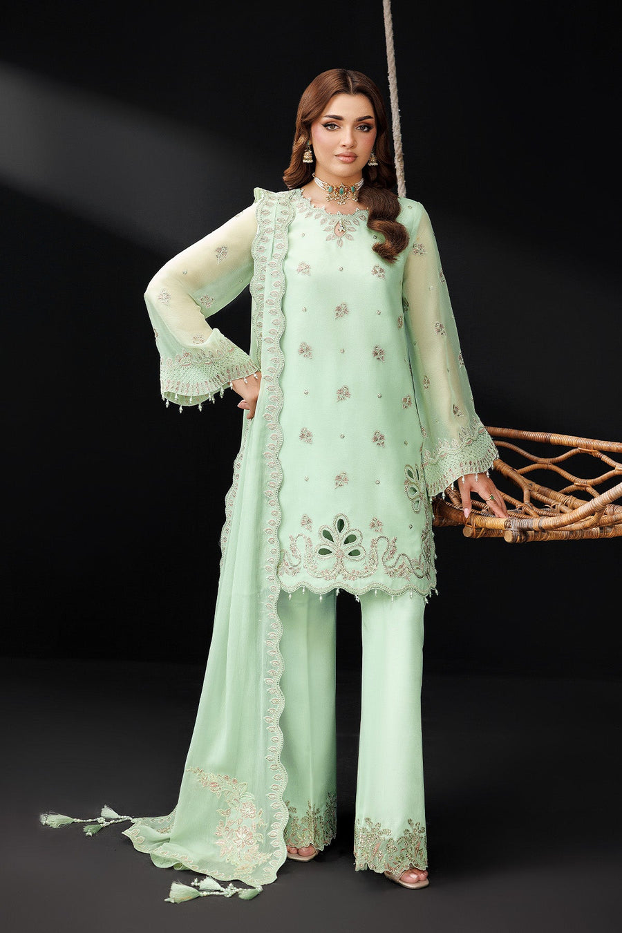 Close-up showing detailed embroidery on the dupatta and wrist accessories
