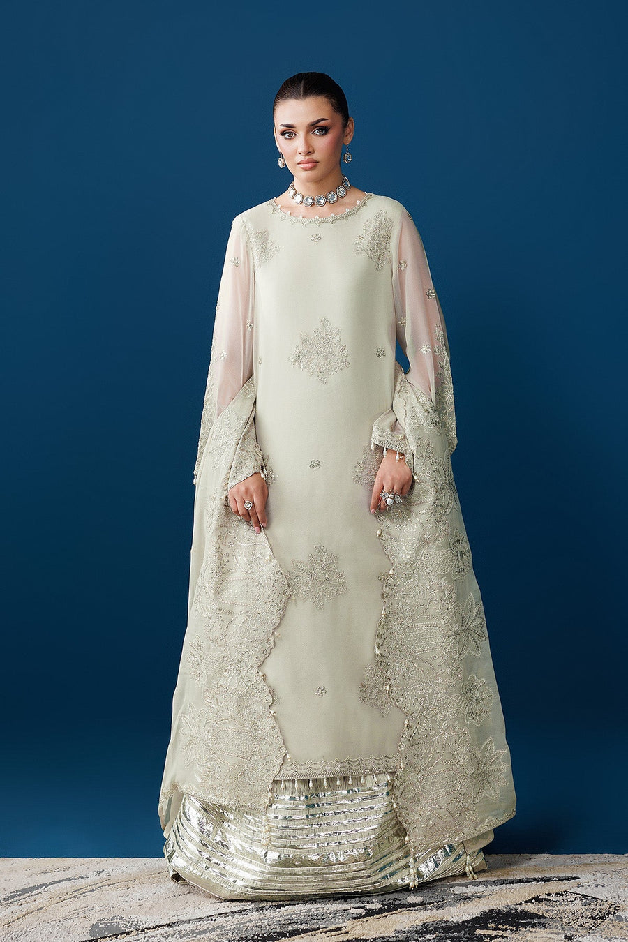 Full front view of the chiffon dress set highlighting silver-striped raw silk trouser and detailed embroidery