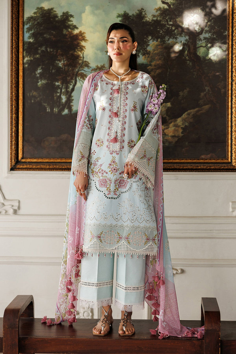 Close-up of embroidered lawn shirt details and beadwork on sleeve
