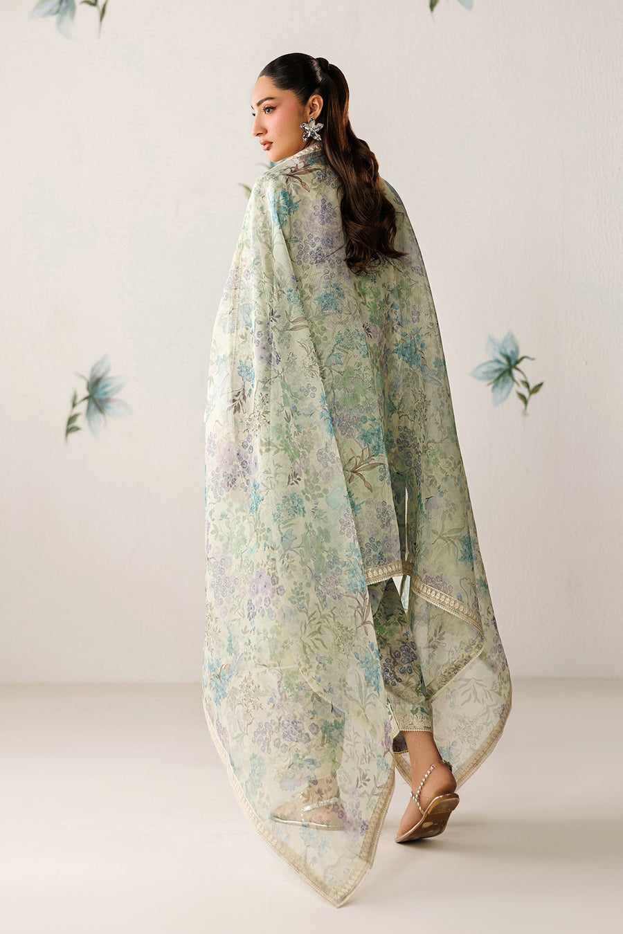 Rear view showing sheer floral dupatta with lace border draped over embroidered lawn suit