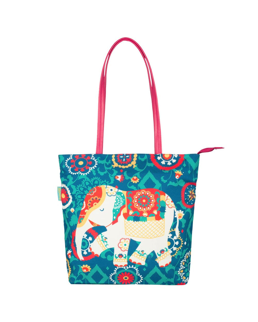 Back view of the tote bag featuring the same colorful floral and elephant print with pink handles