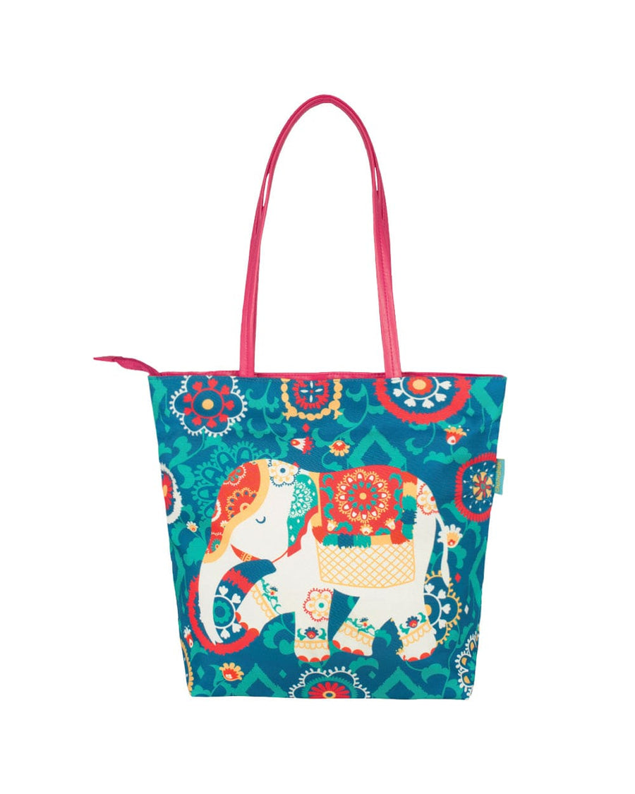 Front view of colorful tote bag featuring a white elephant with intricate floral patterns on a vibrant teal background with pink handles