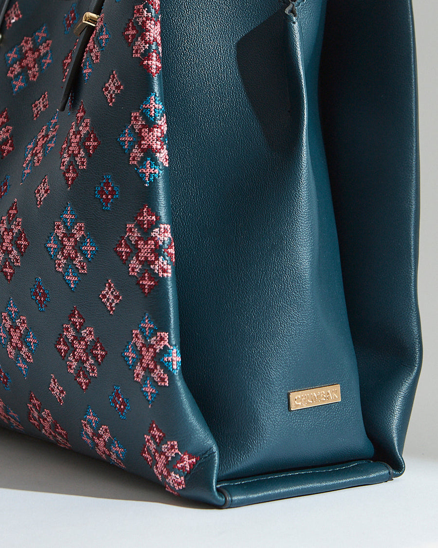 Back view of the plain deep teal vegan leather tote bag without embroidery