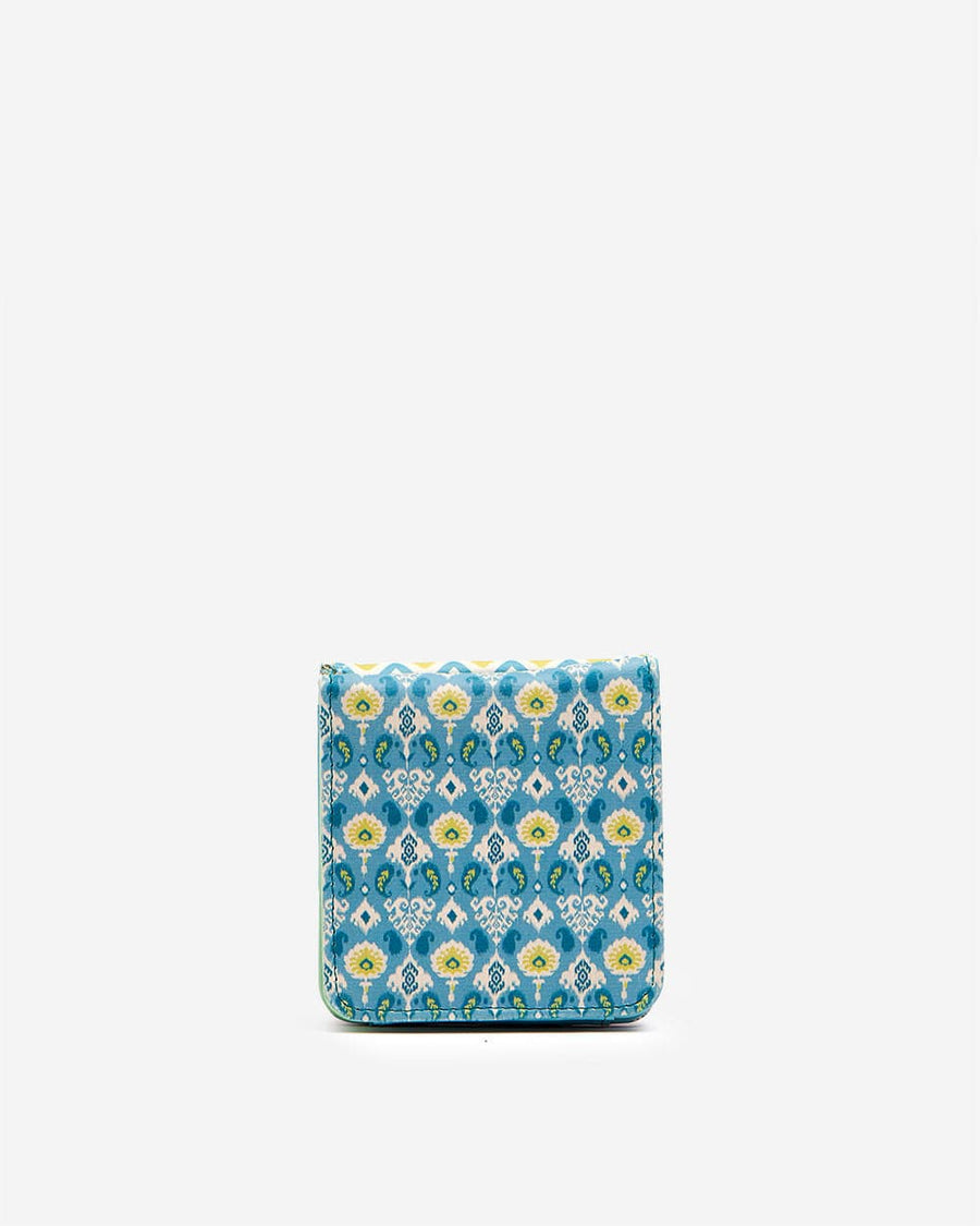 Compact wallet with elegant blue ikat pattern and floral motifs in yellow and white