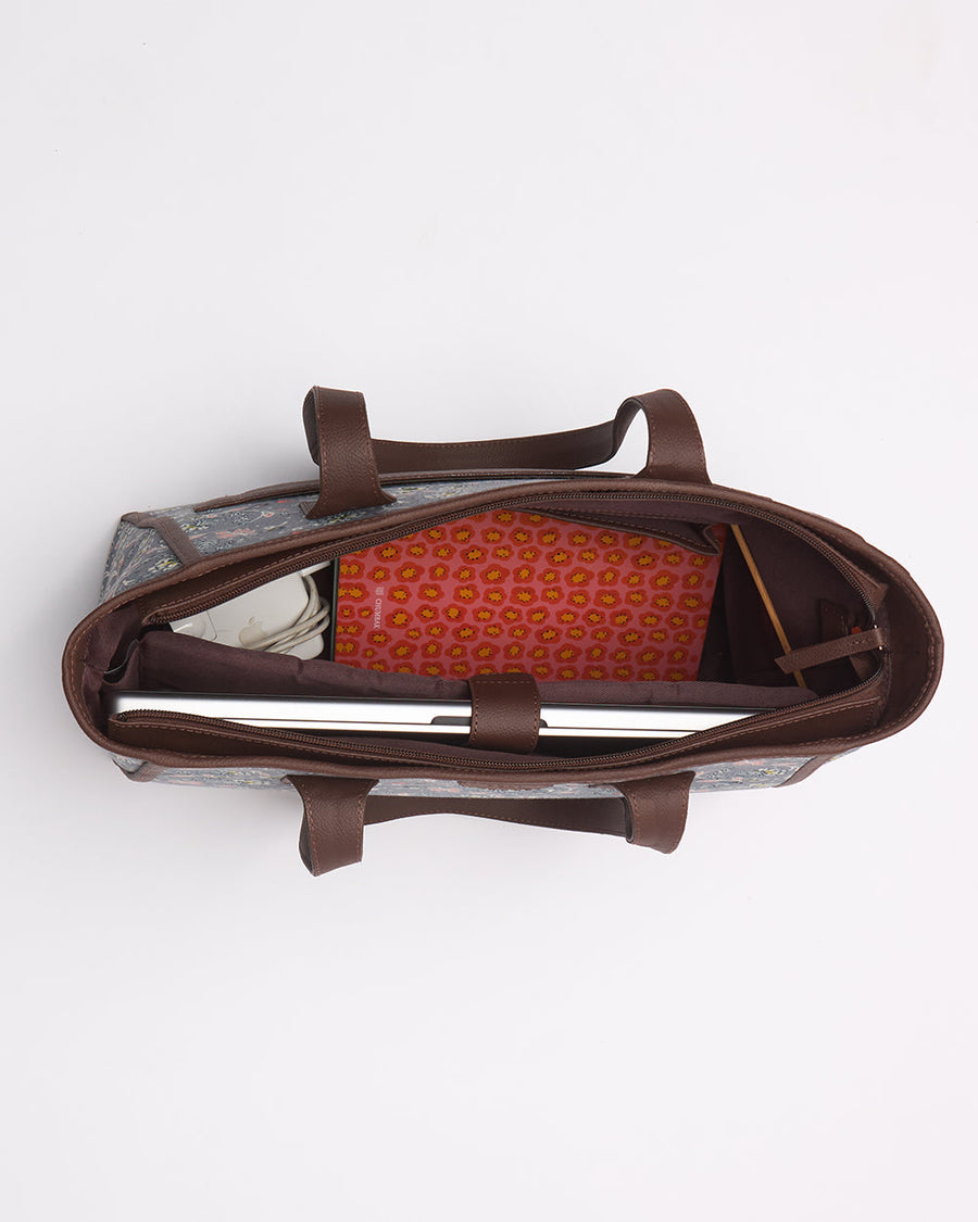 Interior pocket view showing organizer pockets with lipstick and other items