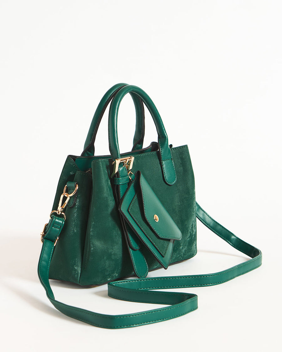 Emerald green handbag with front attached mini pouch and long shoulder strap on white background
