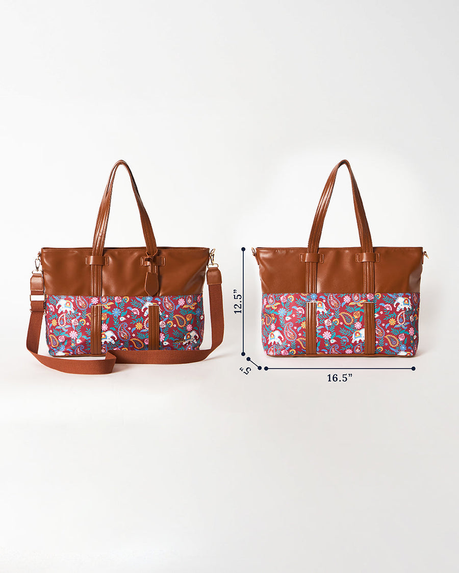 Top-down view of tote bag interior showing ample storage space holding water bottle, wallet, watch, book, and charger