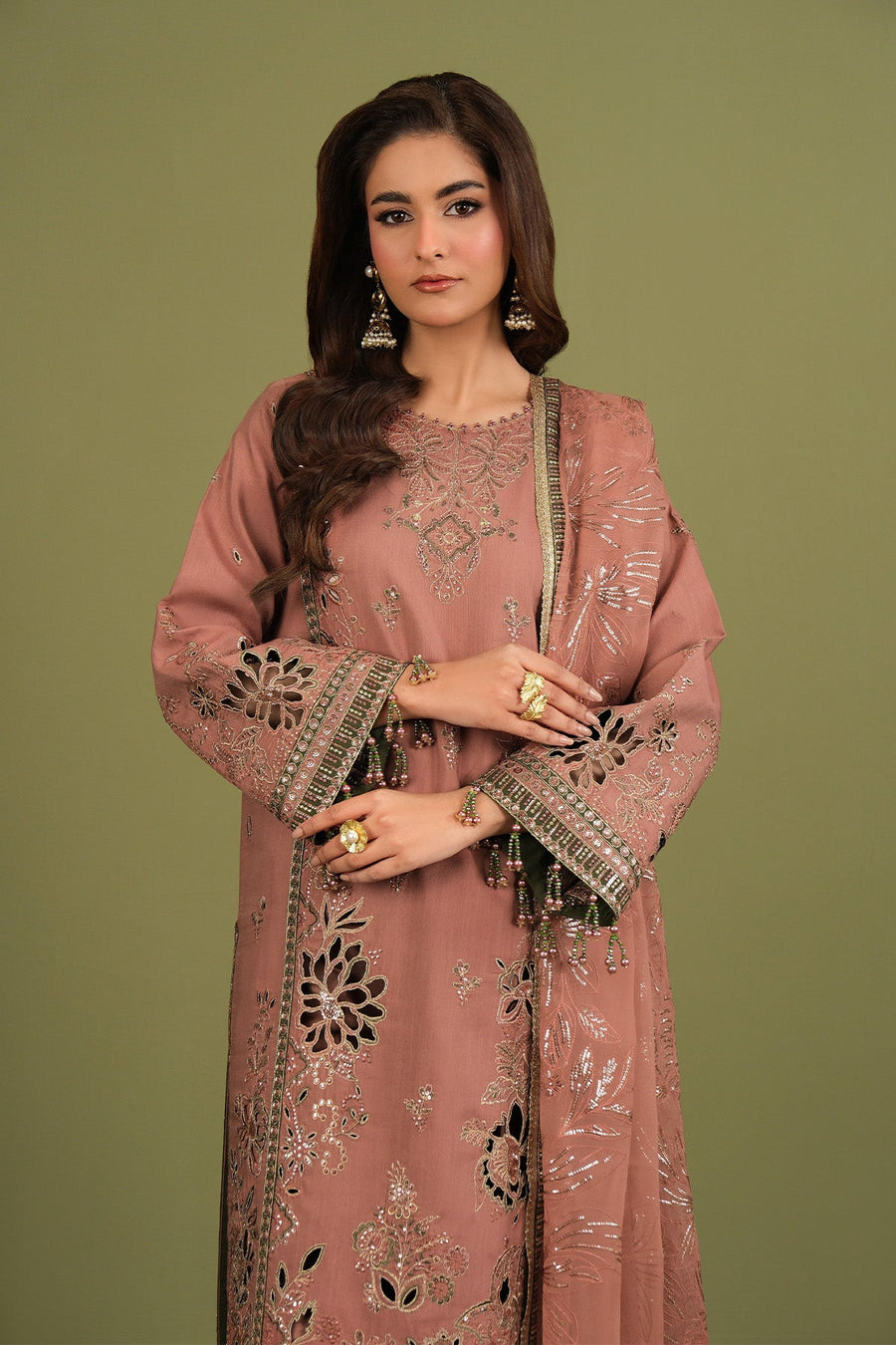 Model holding beautifully embroidered dupatta with shimmering details