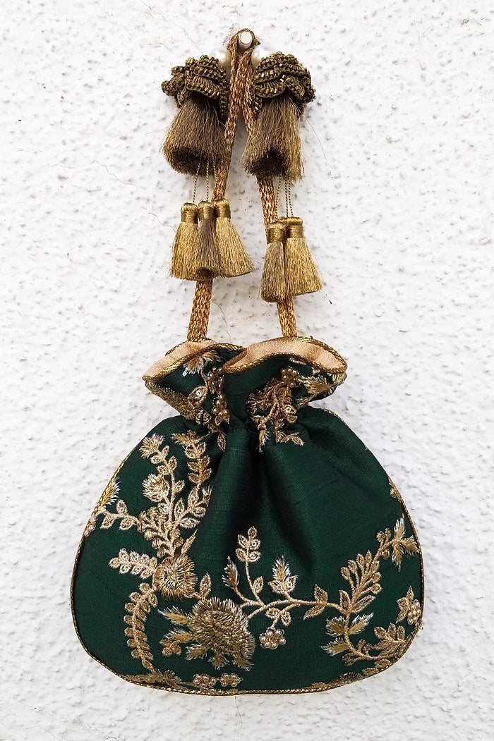 Luxury green silk potli bag with detailed gold floral embroidery and matching gold tassel drawstrings