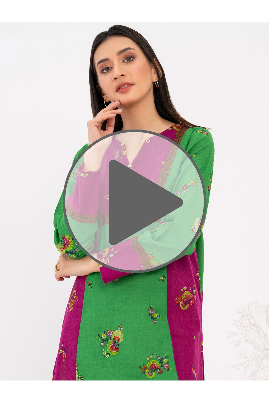 Video preview of woman wearing green and magenta printed khaddar kurti