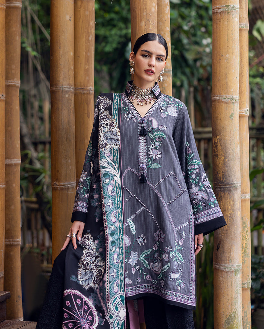 Close-up front view of woman in detailed embroidered Karandi winter tunic and matching printed shawl, accessorized with jewelry