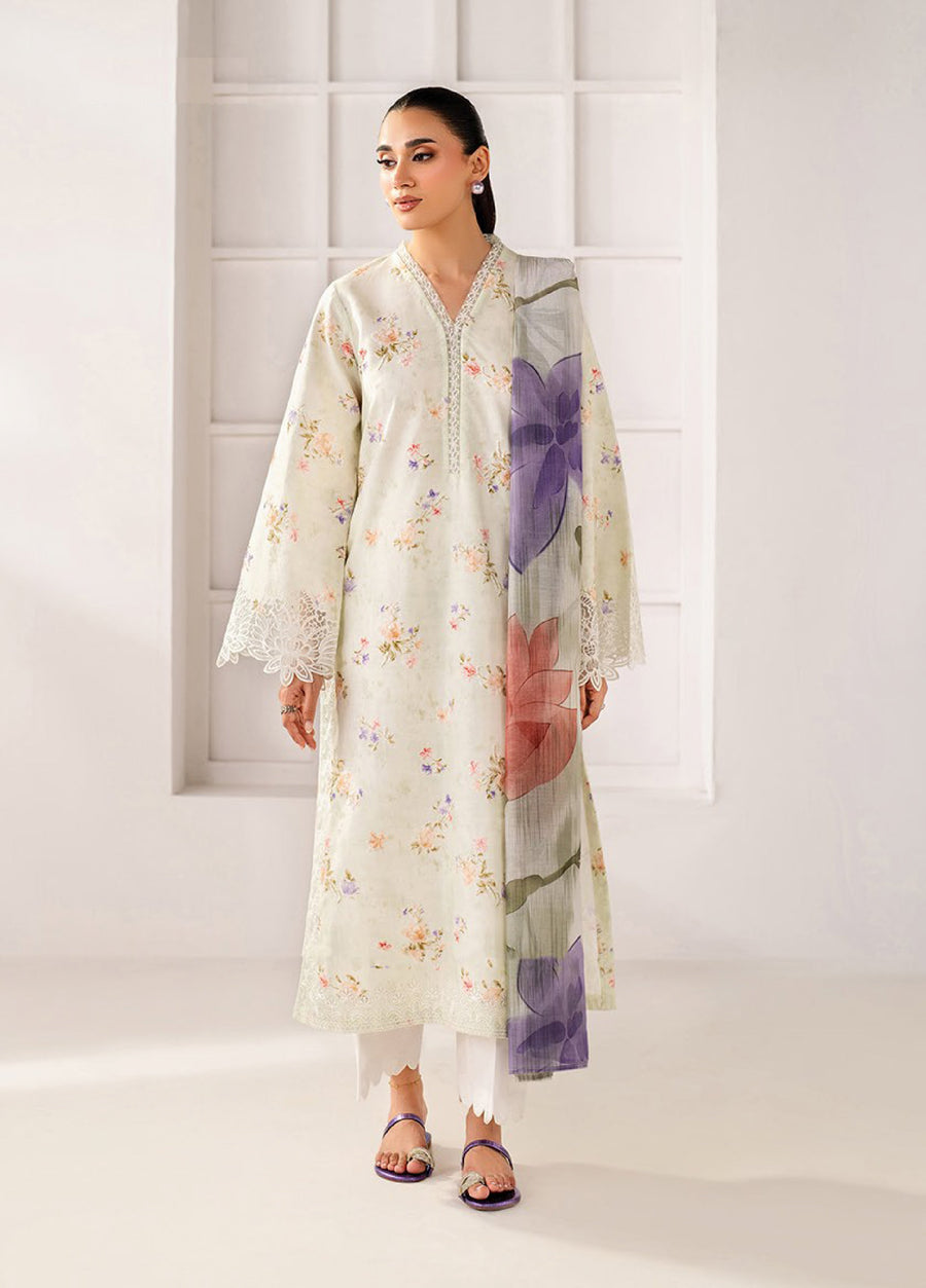 Woman wearing an elegant cream floral lawn suit with embroidered V-neck and lace-trimmed sleeves, paired with white scalloped pants and floral printed dupatta featuring large purple and pink flowers.