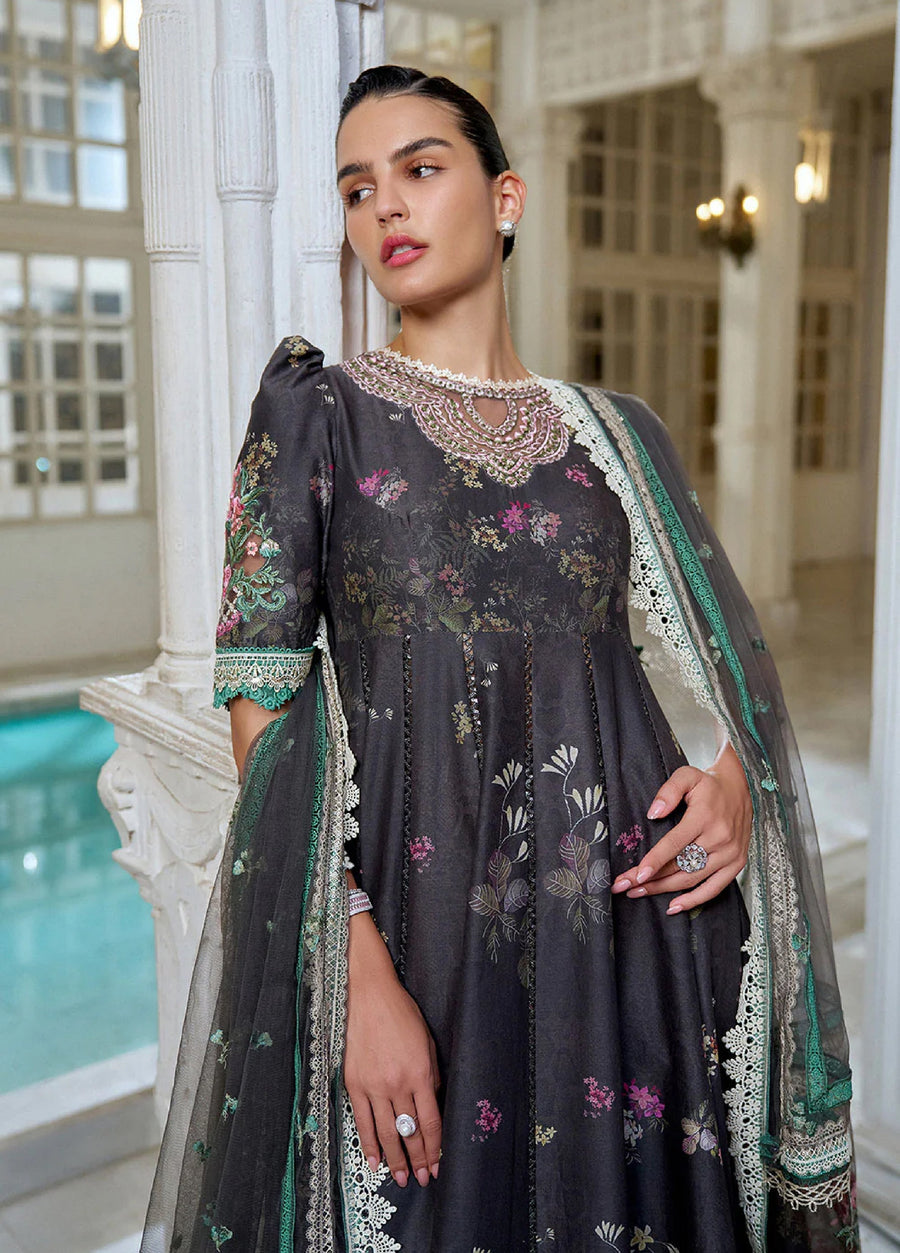 Close-up front view of the upper half of the lawn suit showing detailed floral embroidery around the neckline and half sleeves accented with lace trim.