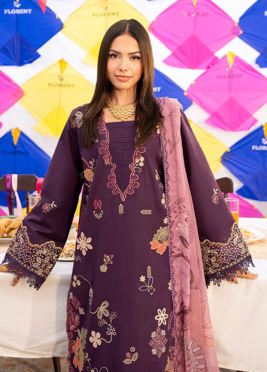 Close-up of woman wearing deep purple suit with intricate floral embroidery and scalloped lace on sleeves, paired with printed chiffon dupatta and gold necklace.