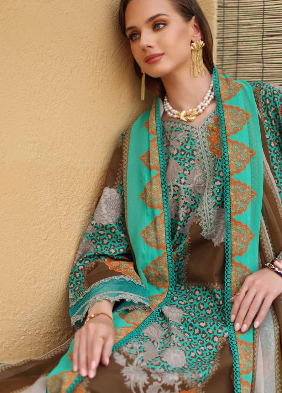 Seated woman showcasing the vibrant printed chiffon dupatta and detailed embroidery on the lawn shirt sleeves and front panel