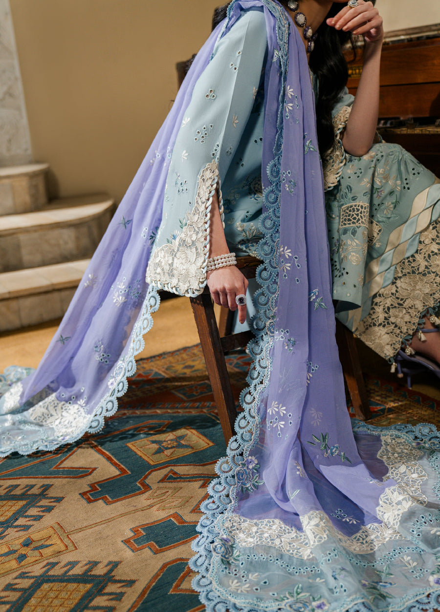 Lavender dupatta with floral embroidery and scalloped lace border displayed over a chair indoors