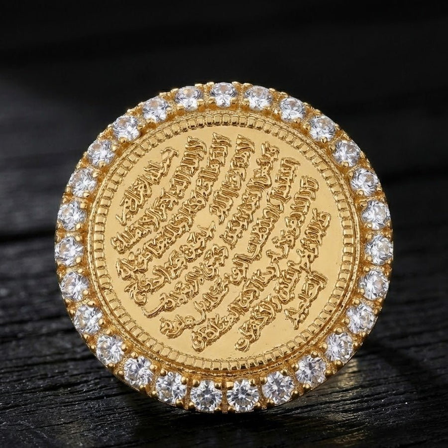 Detailed Ayut-Ul-Kursi ring on a dark background highlighting gold engraving and sparkling stones