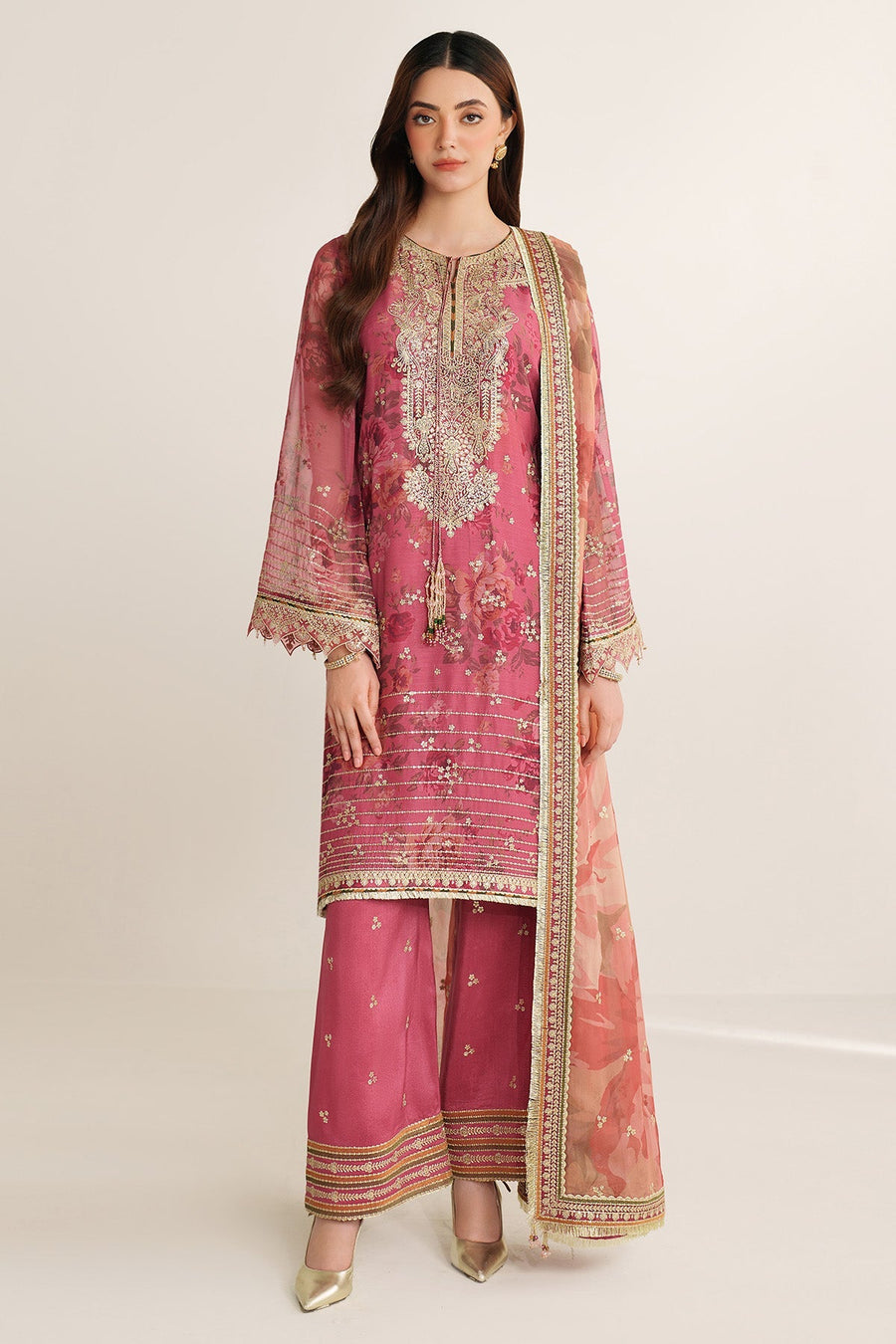 Full front view of woman modeling mauve-pink embroidered chiffon semi-formal suit with palazzo pants and dupatta
