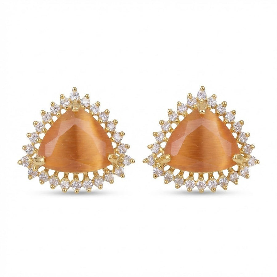 Gold-plated trillion cut amber-colored gemstone stud earrings surrounded by clear stone halo on white background