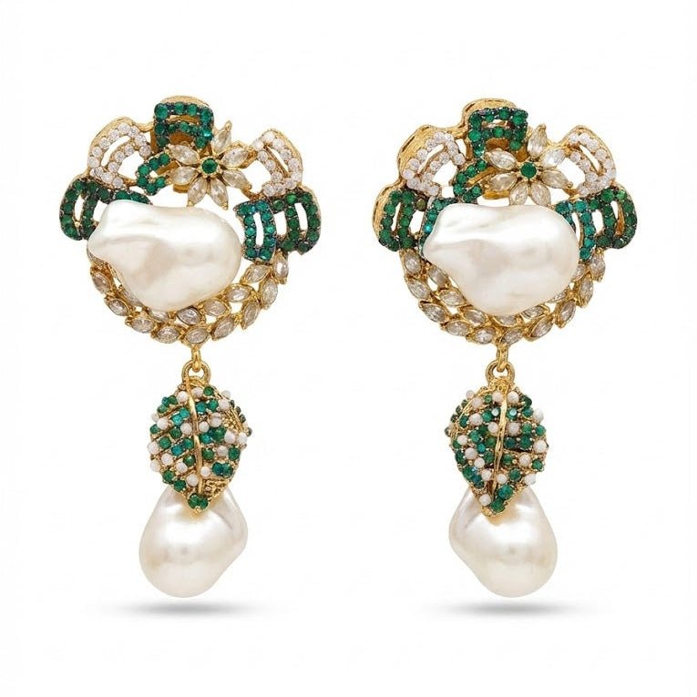 Front view of emerald green drop earrings with white pearls and crystals