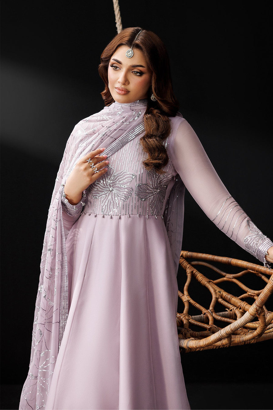 Full front view of lavender embroidered maxi dress with flowing skirt