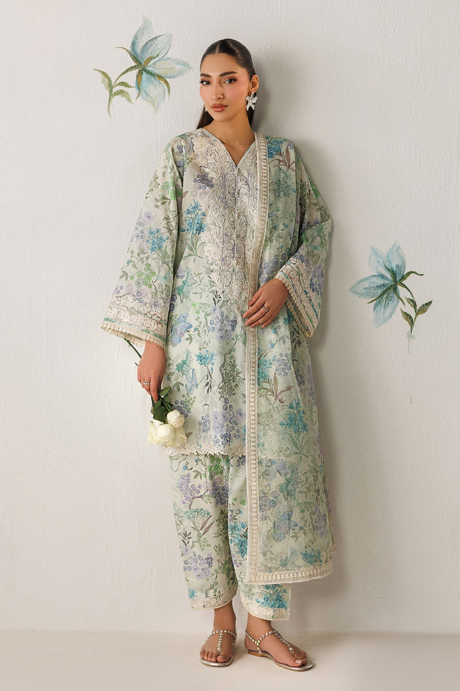 Side view of embroidered lawn sleeves with detailed lace and organza floral embroidery