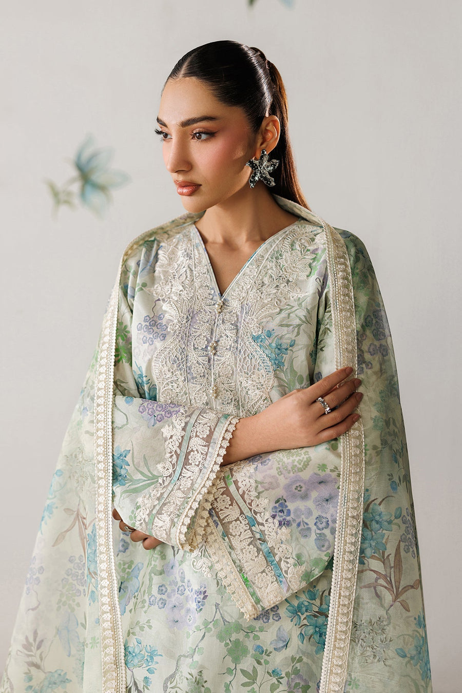 Full outfit view showing three-piece embroidered lawn suit with matching floral print trousers and lightweight dupatta