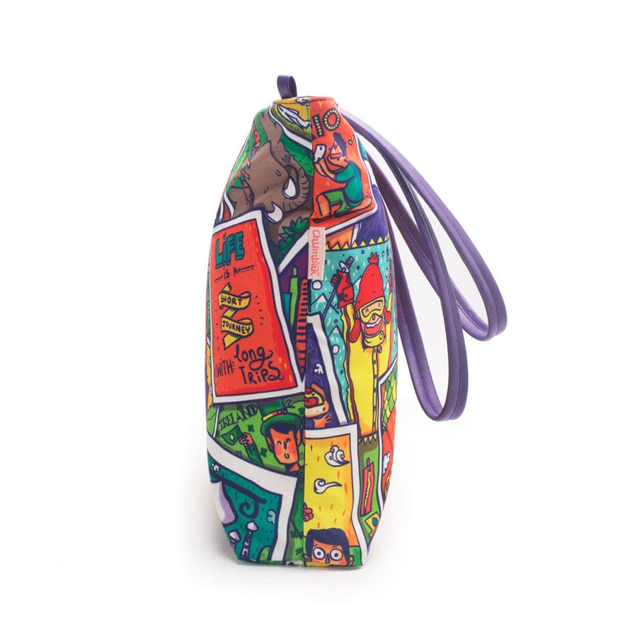 Side profile of the tote bag showing its slender depth and vibrant pattern with purple handles