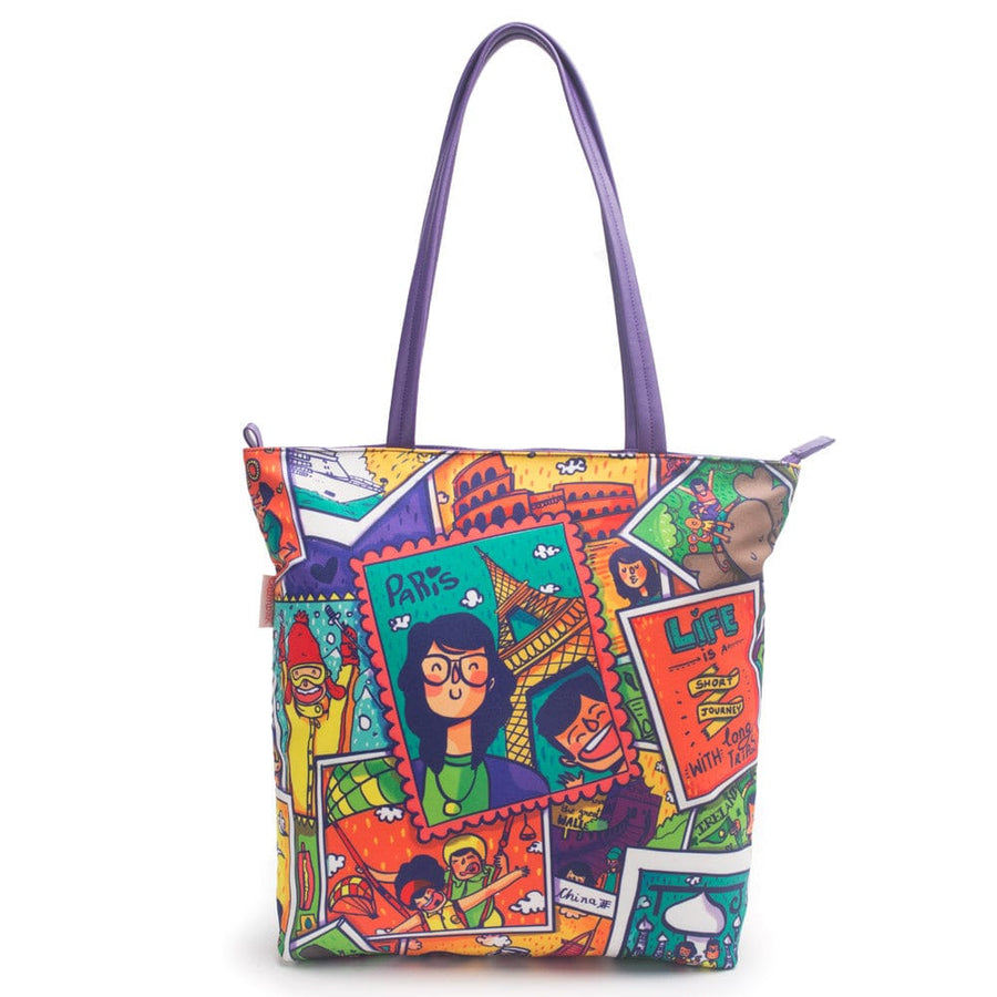 Front view of a colorful tote bag with travel-themed cartoon illustrations and purple handles