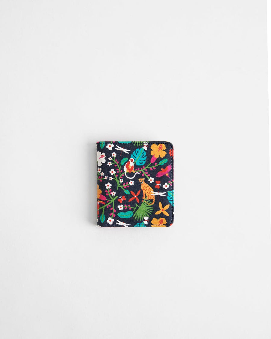 Compact mini wallet with vibrant floral and wildlife print on navy background featuring colorful leaves, flowers, and animals