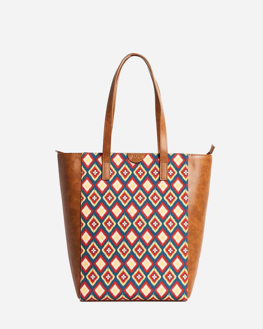 Back view of Teal by Chumbak tote bag highlighting embroidered fabric panel and brown leather-like handles