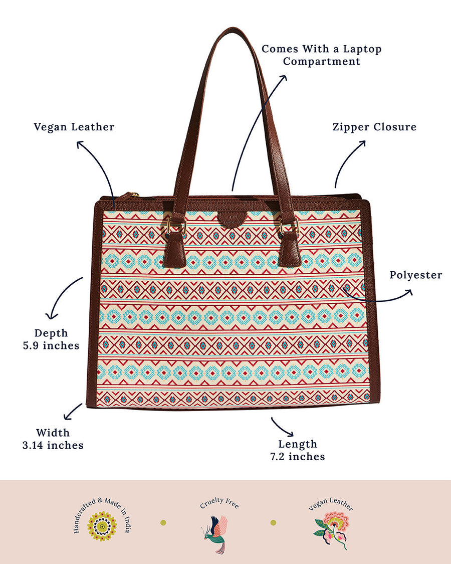 Full front view of the tote bag with Aztec geometric pattern, brown vegan leather handles, and minimal branding, photographed on a neutral background