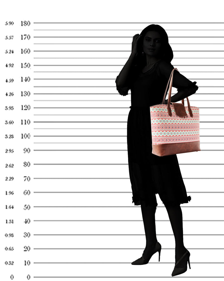 Silhouette of woman carrying Aztec patterned tote bag against height measurement backdrop