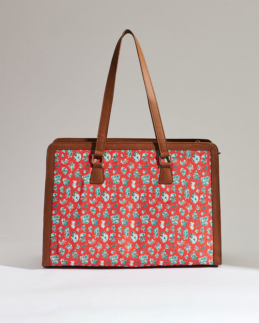 Open tote bag interior showing brown fabric lining with multiple inner pockets including zipped compartment