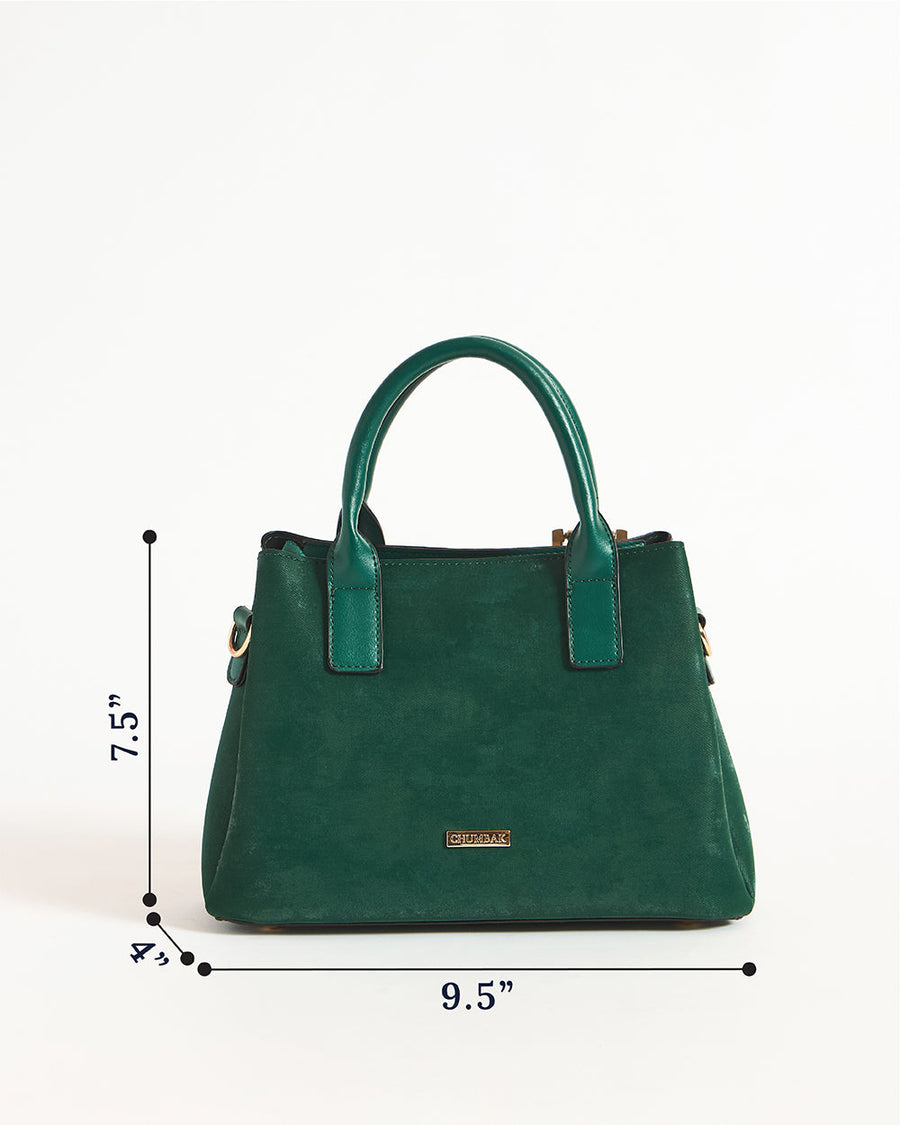 Back view of emerald handbag with gold hardware and attached mini pouch close-up