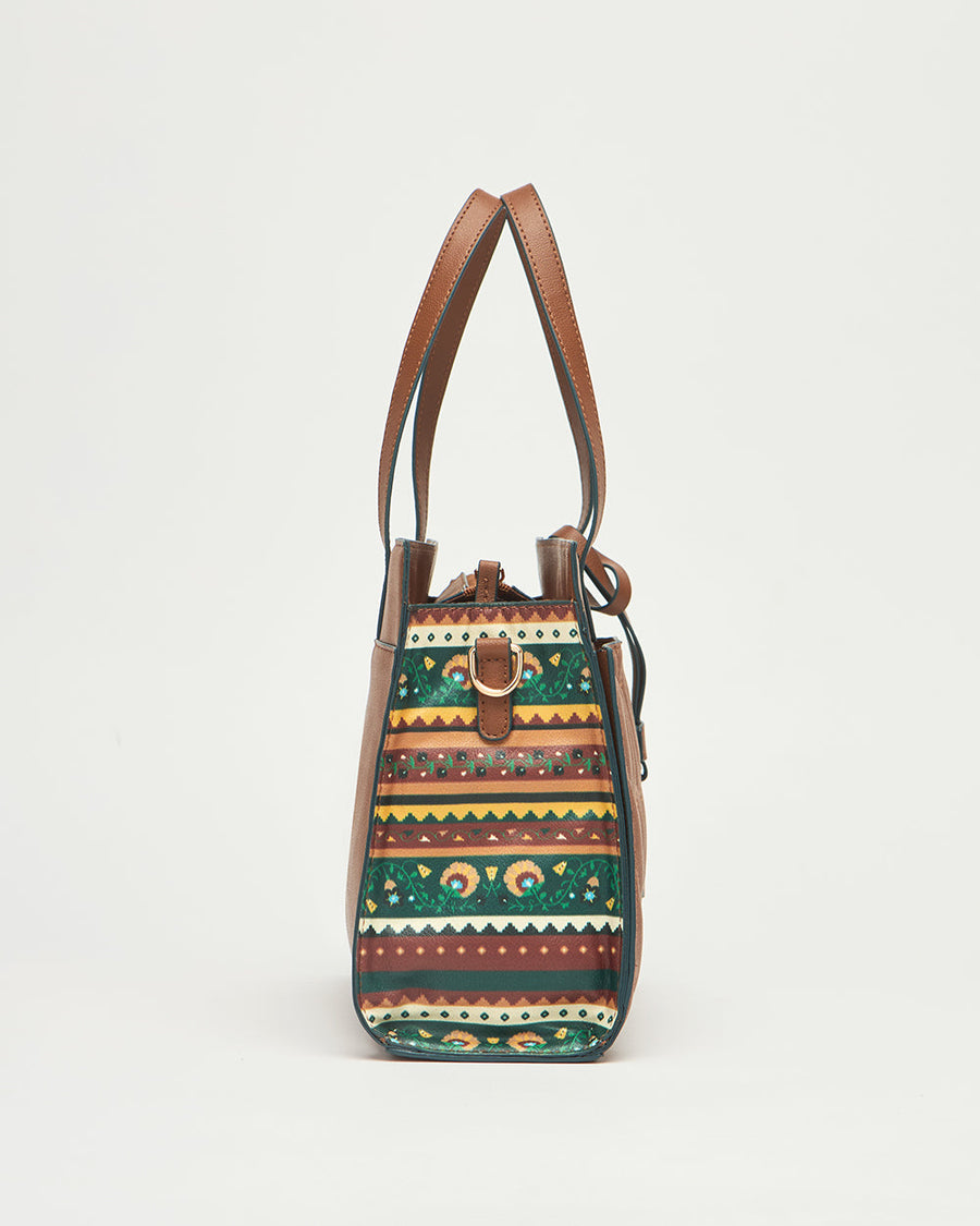 Handbag open showing soft fabric lining with inner zipper pocket and multiple compartments