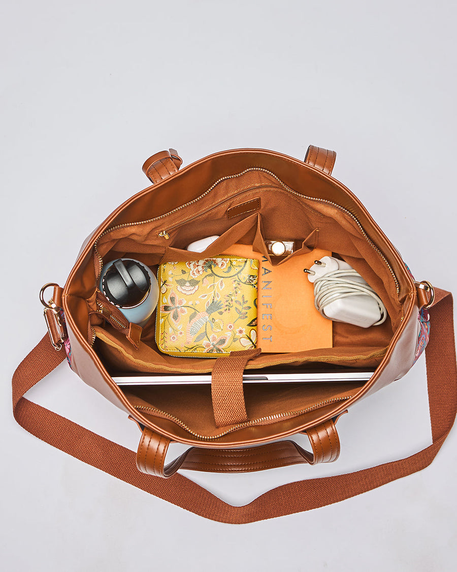 Close-up of padded laptop compartment securing a closed laptop inside the bag