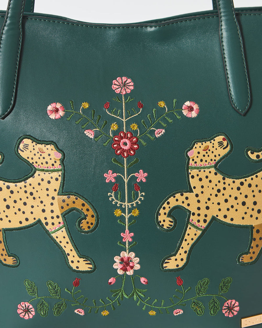 Front and back views of deep green vegan leather tote bag with dimensions: 46 cm width x 32 cm height x 13.5 cm depth on white background