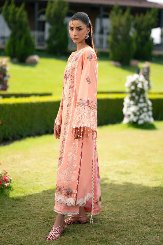 Side view of peach embroidered lawn suit showing detailed lace and bead fringed sleeves