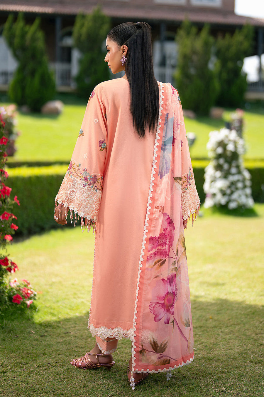 Back view of peach lawn suit showing plain dyed lawn with floral printed chiffon dupatta