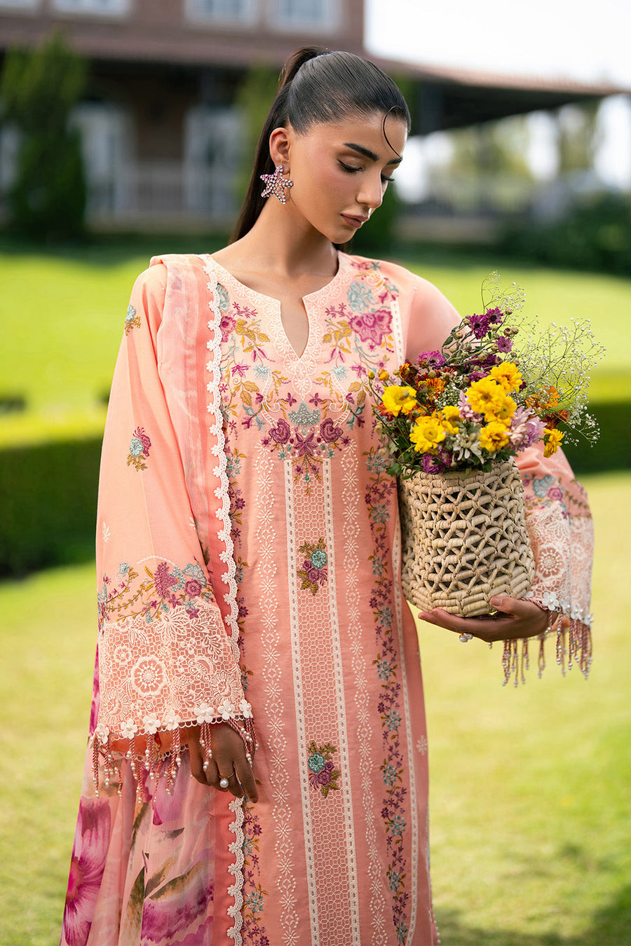 Closer front view highlighting floral embroidery on lawn suit and lace trim on trousers