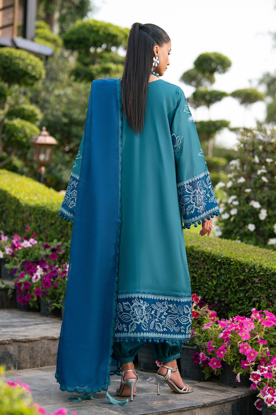 Back view of the embroidered lawn shirt and dupatta revealing detailed embroidery on sleeves and hem