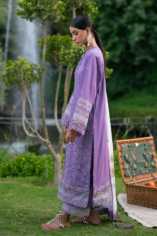 Side view of purple lawn suit showing embroidered sleeves and side slit