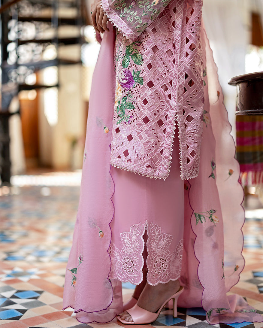 Front close-up showing buttoned neckline, intricate floral embroidery, and lace accents on a pastel pink lawn shirt, paired with an embroidered dupatta.