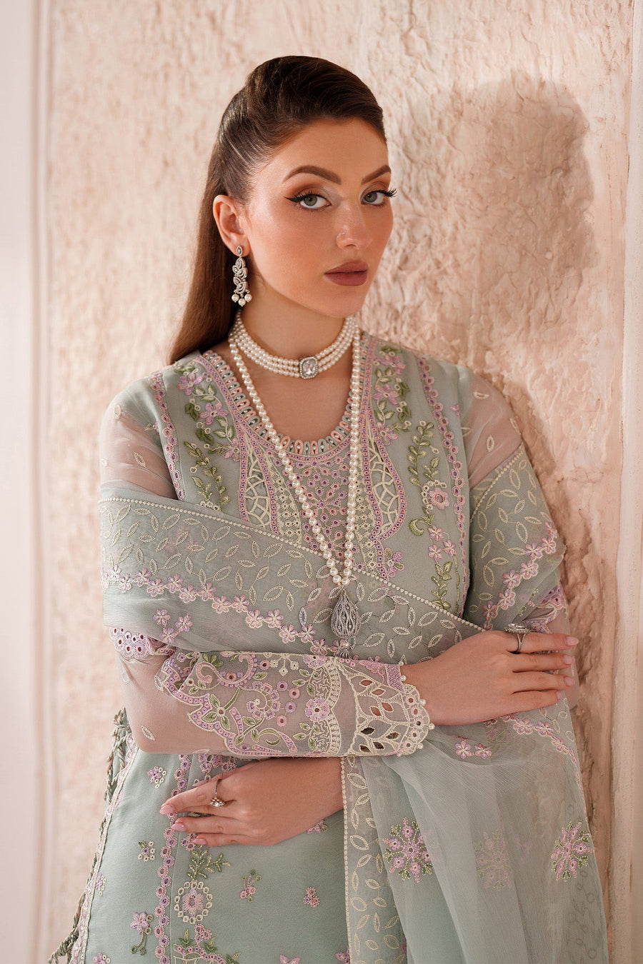 Close-up showing delicate embroidery on sleeve and dupatta