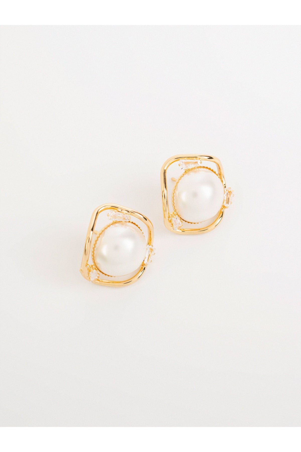 Gold Pearl Stud Earrings | Curved Frame Design