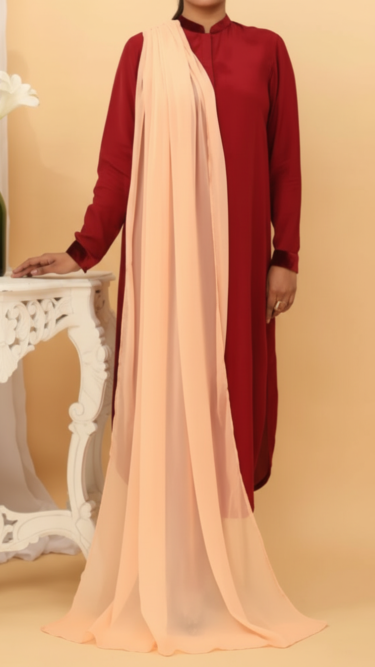 Woman wearing deep red traditional Pakistani dress with elegant peach plain chiffon dupatta draped over shoulder