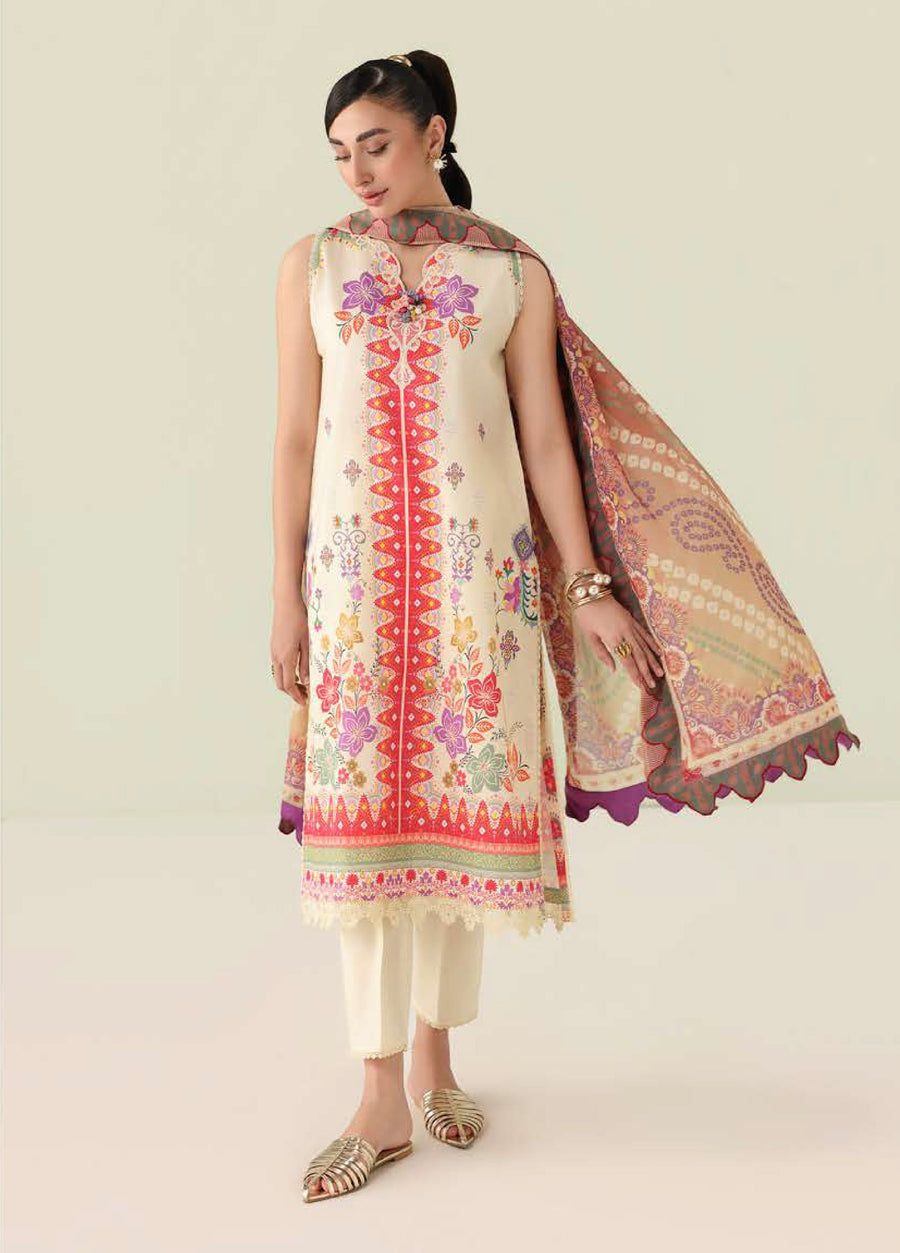 Woman wearing embroidered floral lawn 3-piece suit with printed silk dupatta and straight trousers.