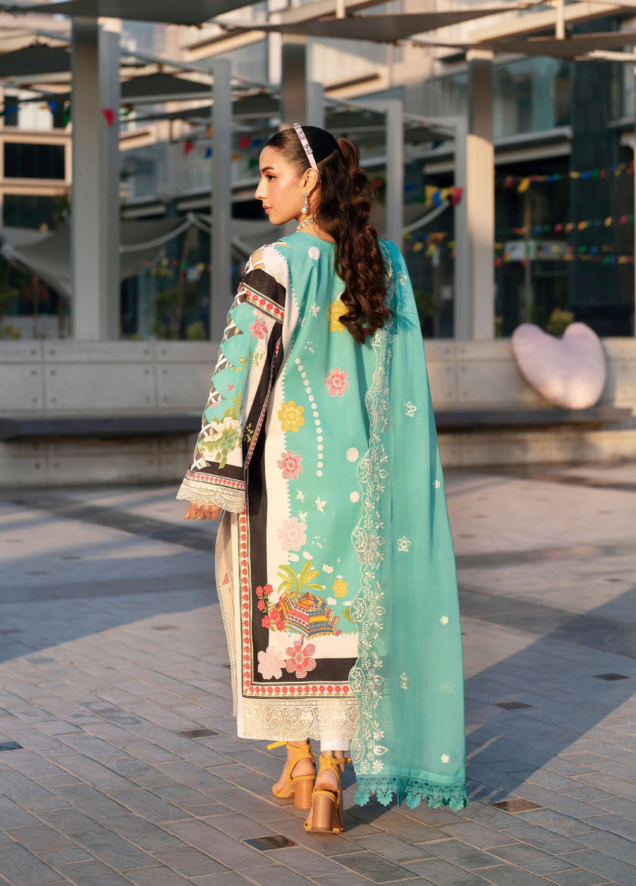 Rear view of woman showcasing the back and full sleeve printed design of the turquoise lawn suit with matching chiffon dupatta.